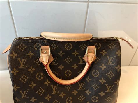 louis vuitton gebraucht tasche